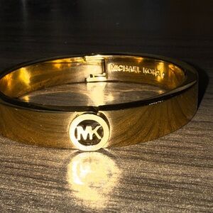 Micheal kors gold open clasp bracelet